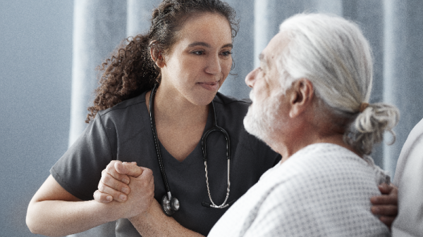 Nurse helping elderly patient